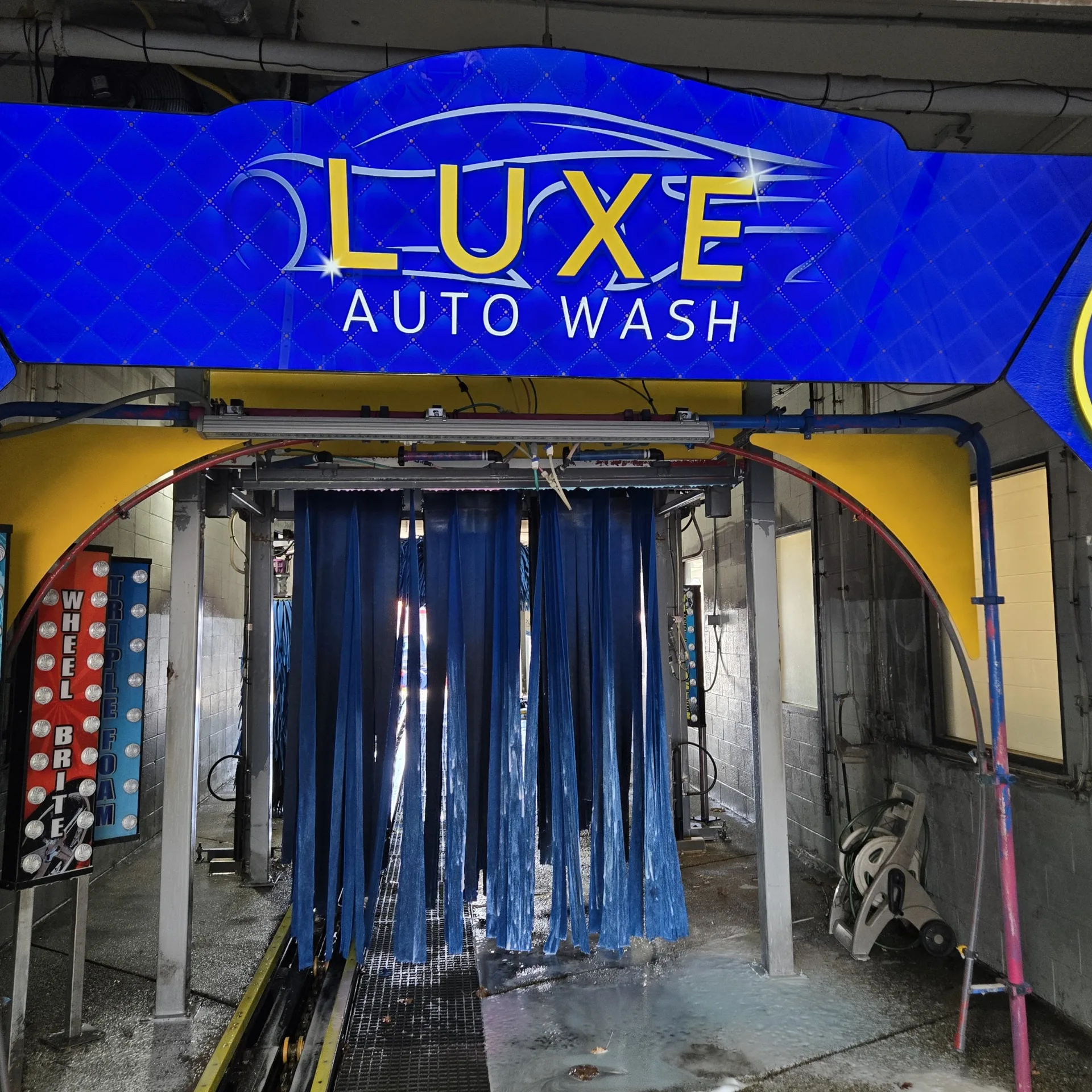 Soft-touch cloth brushes inside the Luxe tunnel