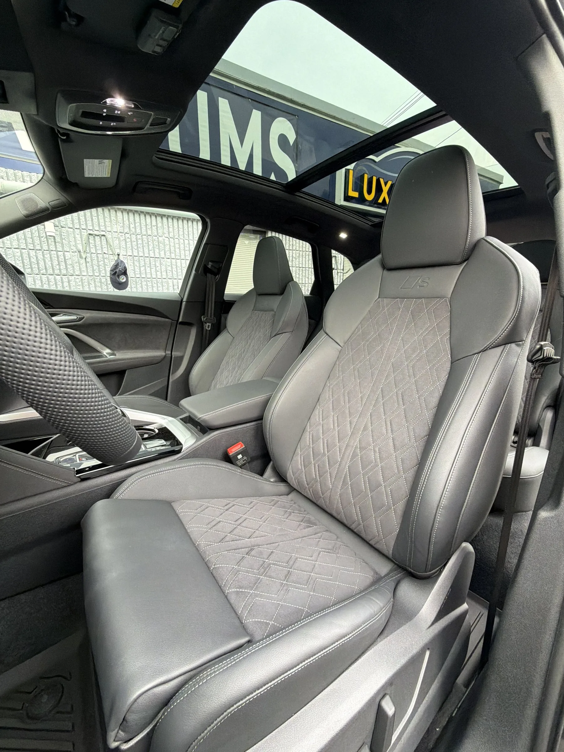 A freshly vacuumed car interior at Luxe Auto Wash